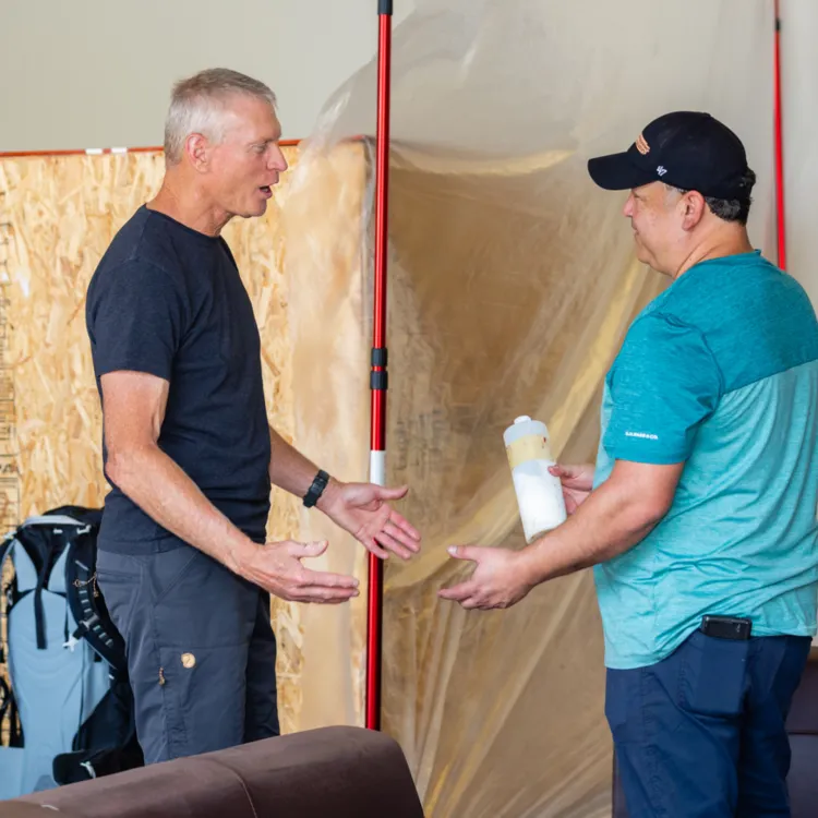 Michael discussing leather furniture during an evaluation