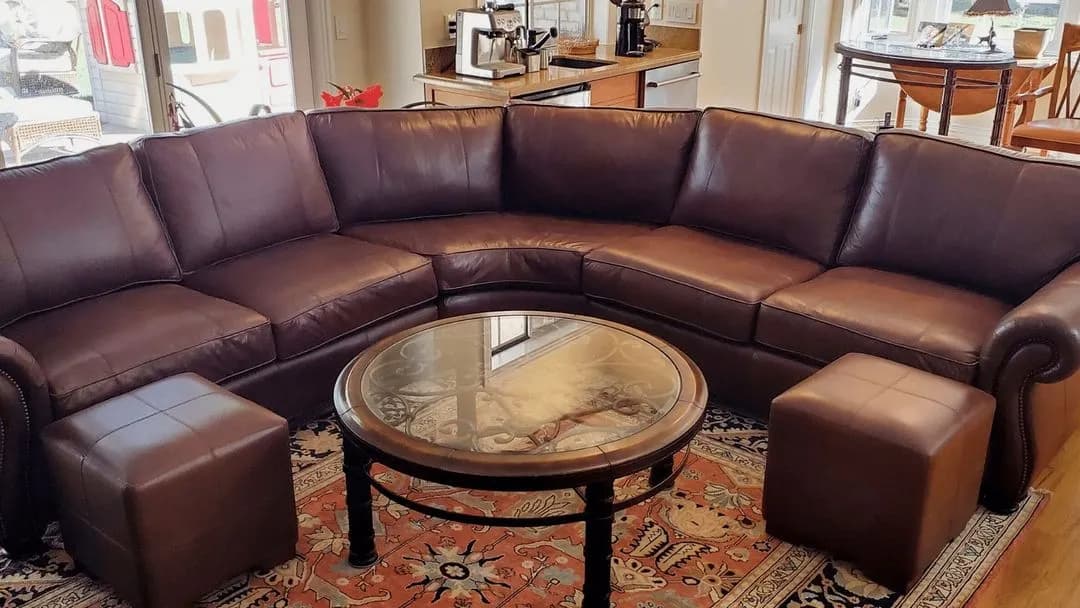 Brown leather sectional in a residential interior